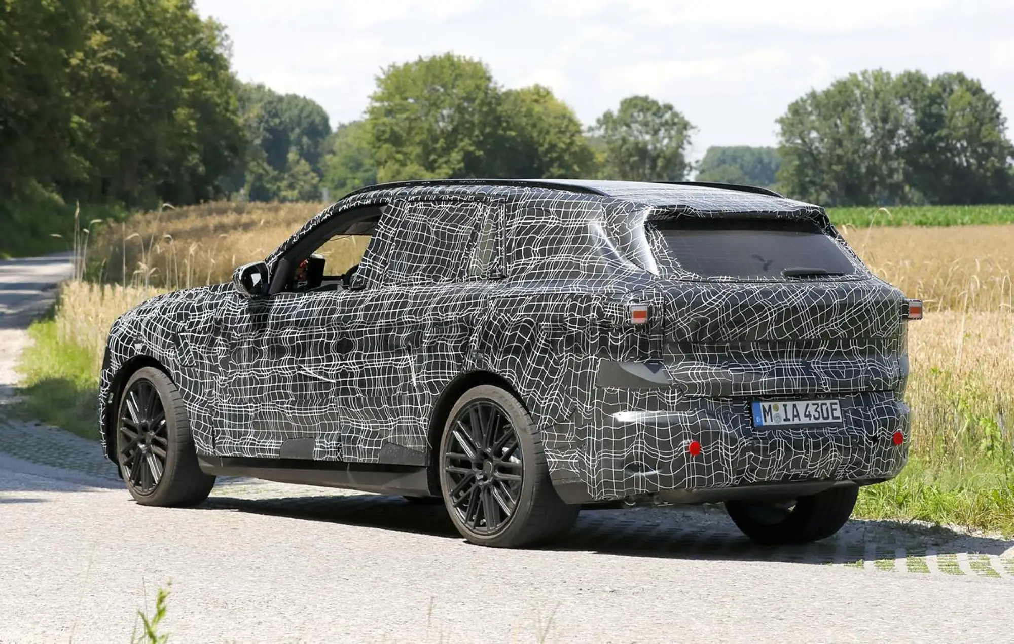 BMW X5 2027 - Foto spia 11-07-2024 - 12