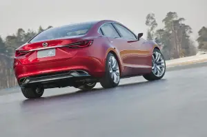 Mazda Takeri 2012 - 4