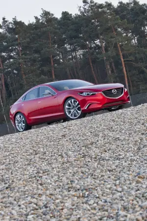 Mazda Takeri 2012 - 8