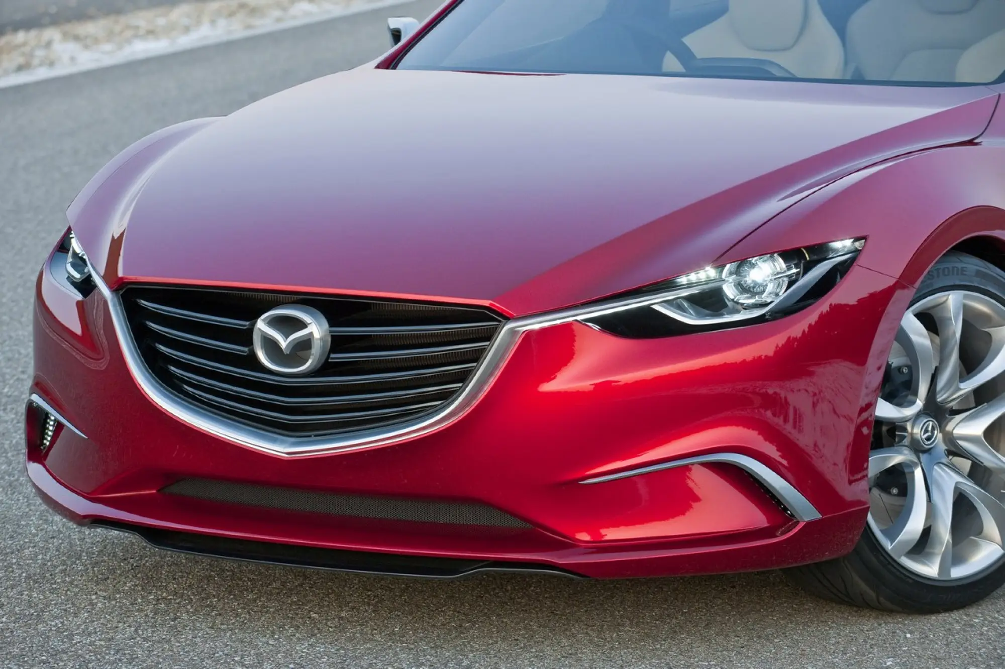 Mazda Takeri 2012 - 11