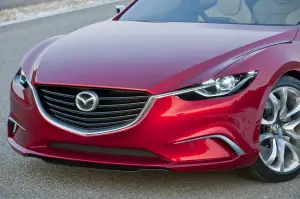 Mazda Takeri 2012 - 11