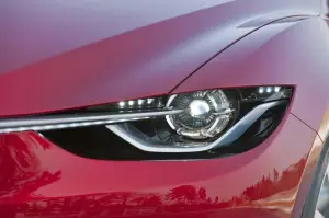 Mazda Takeri 2012 - 1