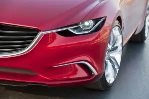 Mazda Takeri 2012 - 12