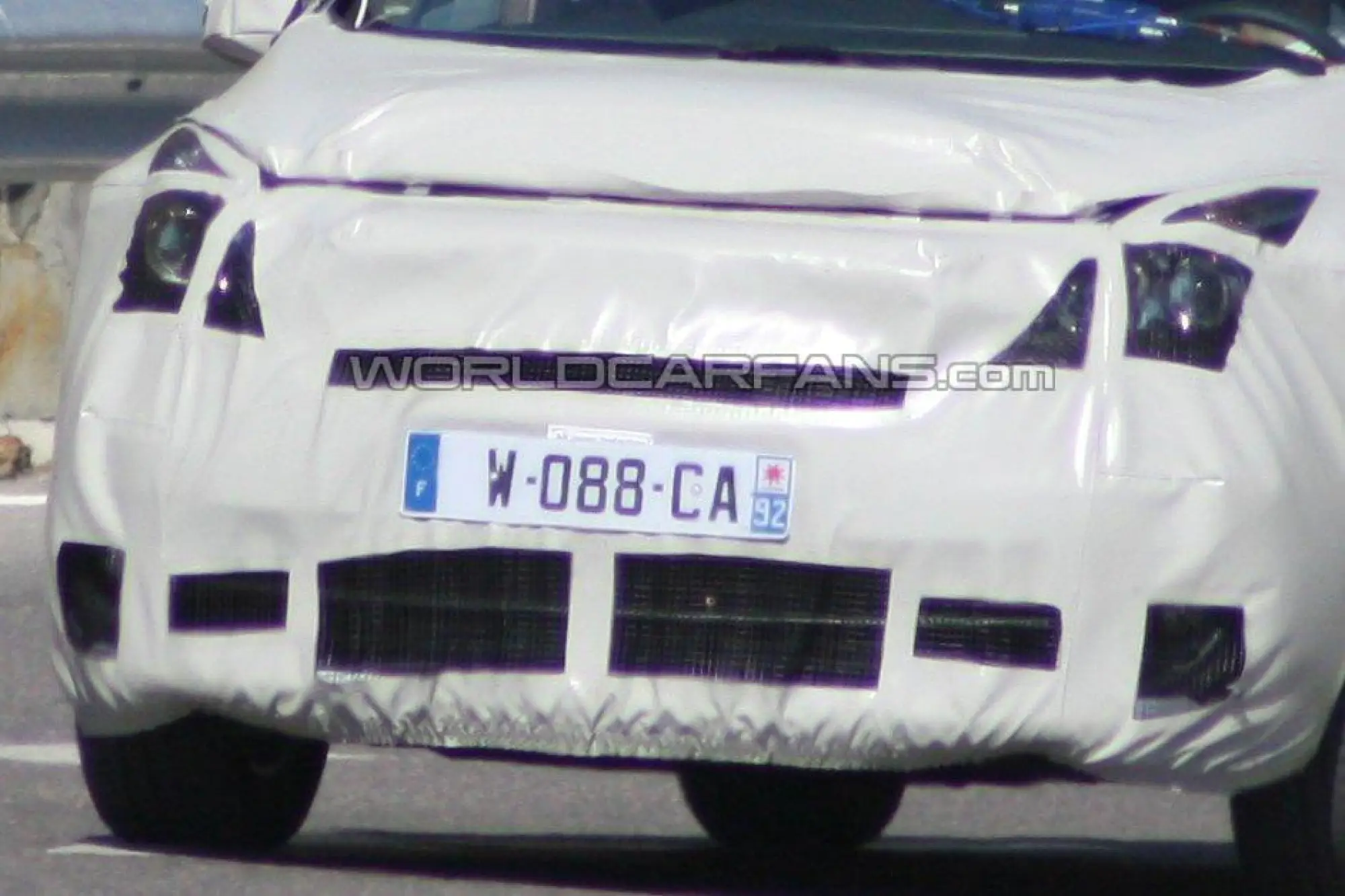 Renault Scenic restyling MPV foto spia luglio 2011 - 7