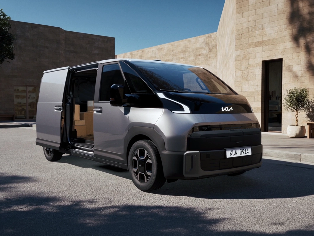Kia PV7 Cargo vista tre quarti porta aperta